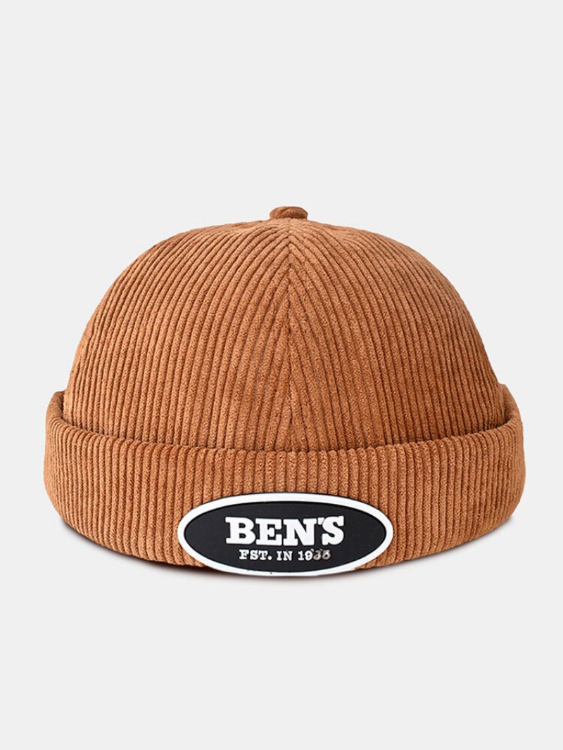 Unisex Solid Corduroy-bokstaver Oval Etikett All-match Justerbar Brimless Beanie Landlord Cap Skull Cap