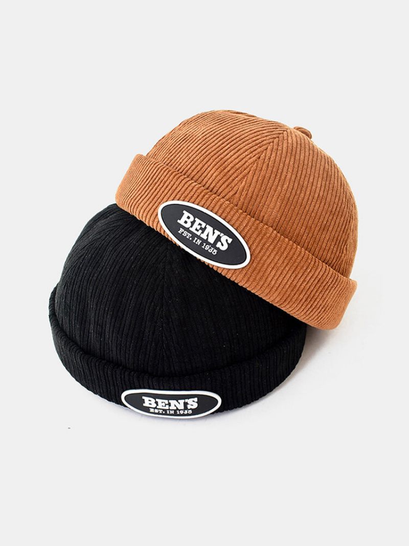 Unisex Solid Corduroy-bokstaver Oval Etikett All-match Justerbar Brimless Beanie Landlord Cap Skull Cap