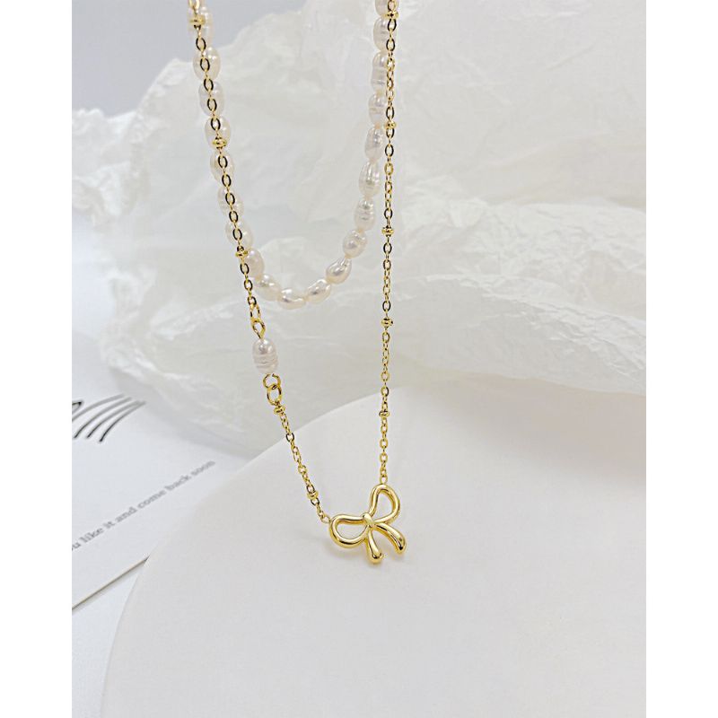 Hollow Bow Pearl Texture Titanium Steel Halskjede Ins Nisje Design Clavicle Chain