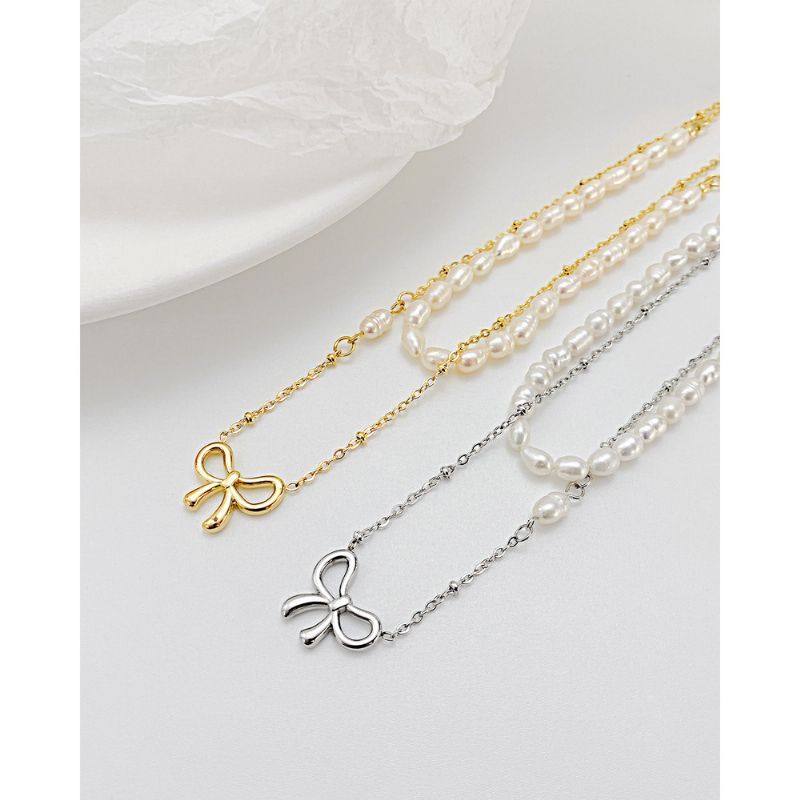 Hollow Bow Pearl Texture Titanium Steel Halskjede Ins Nisje Design Clavicle Chain