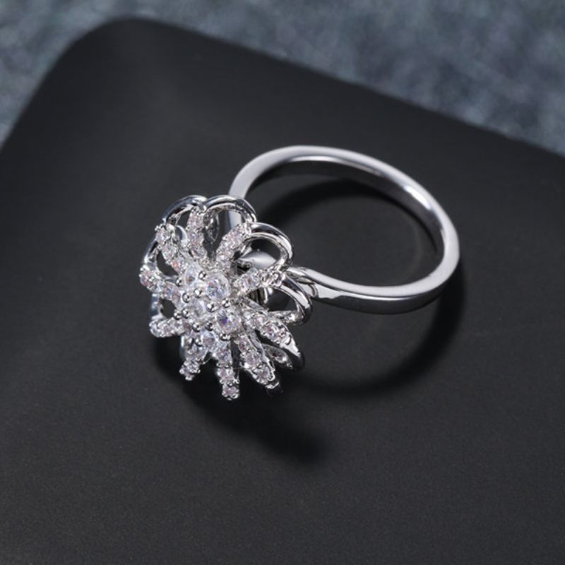 Blendende Zirconia Flower Windmill Snowflake Charm Roterbare Mote Sølvringer